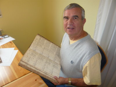Stan with old church record book
