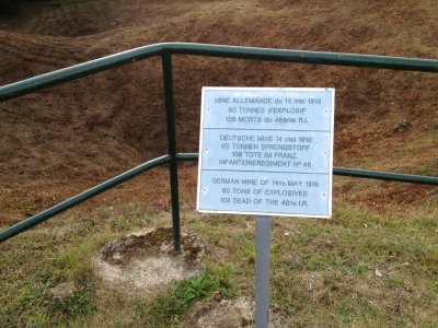 Sign At Crater Created By Mine Explosion